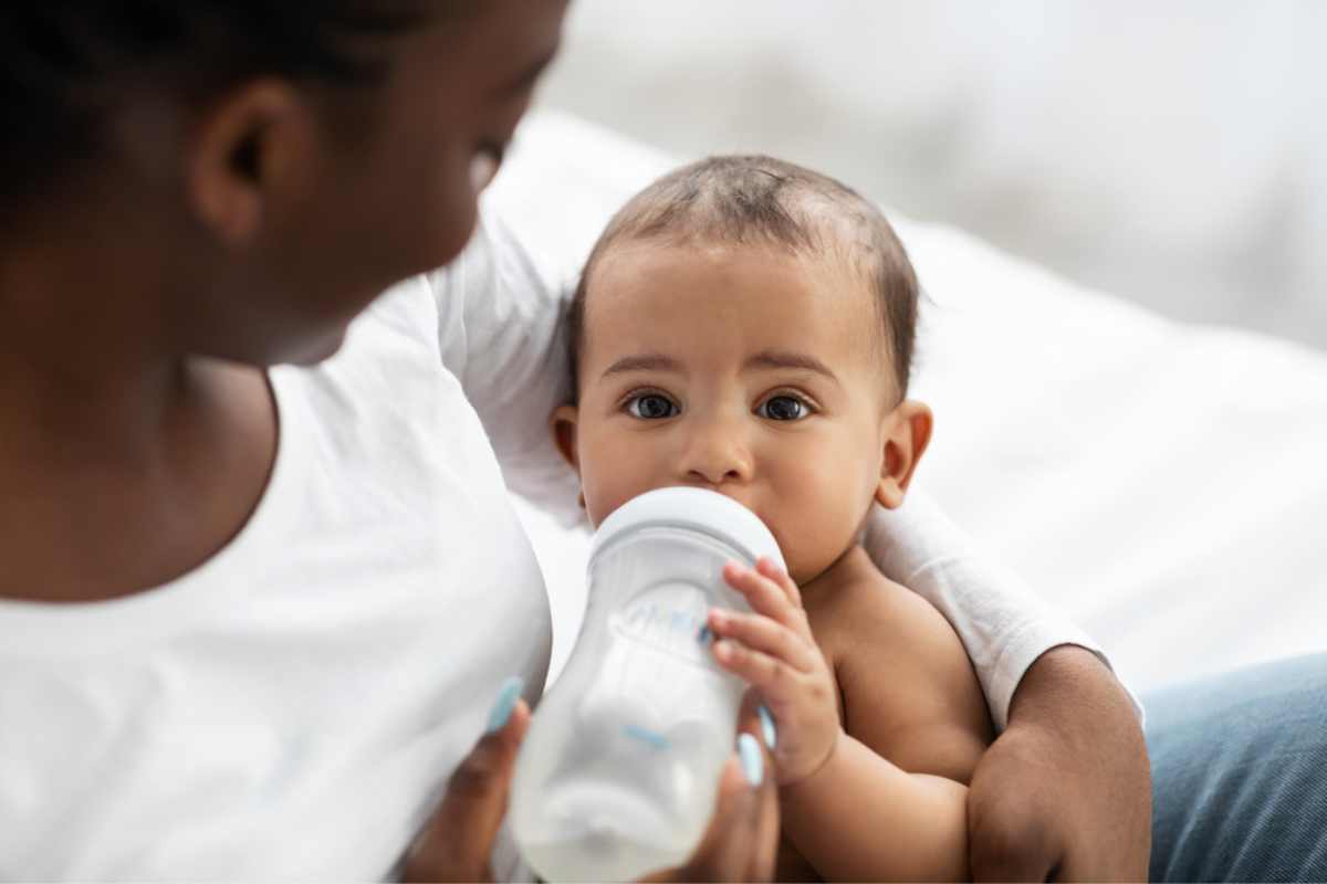 mom feeding child