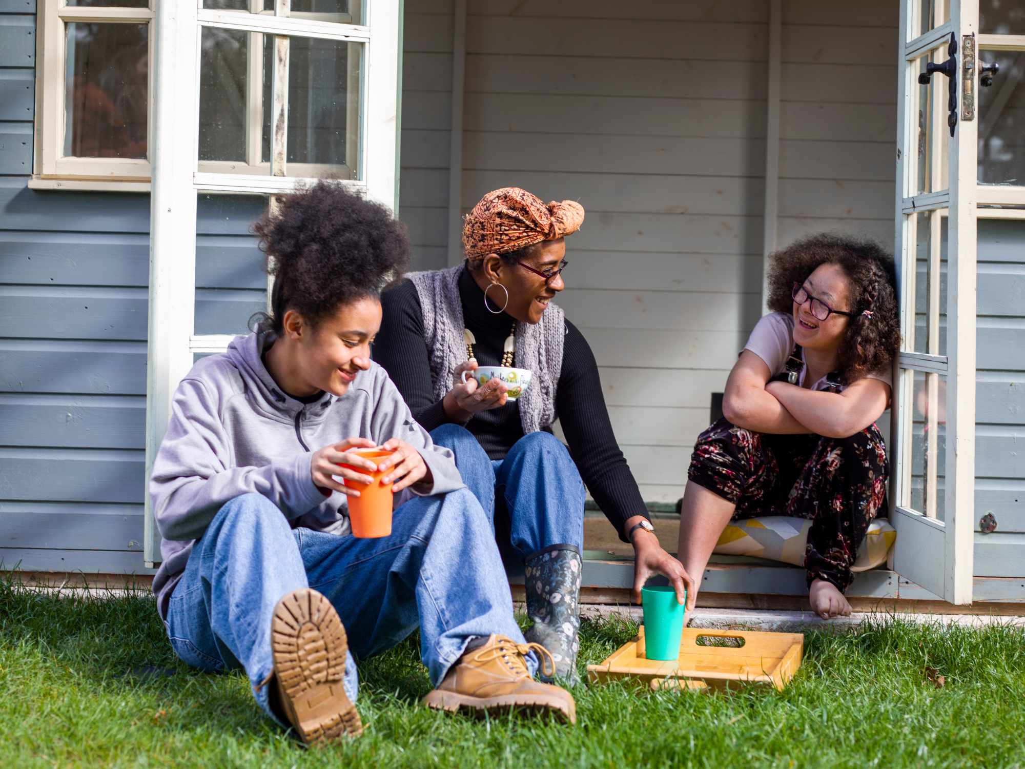 Family talking outside of home