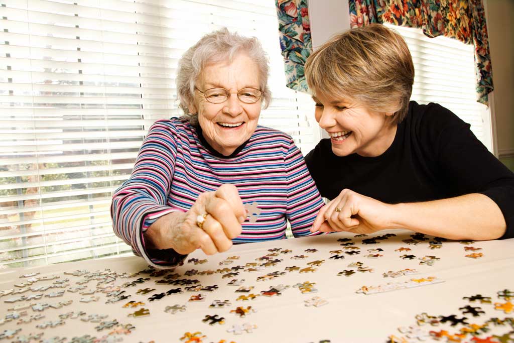 Retired seniors doing puzzles