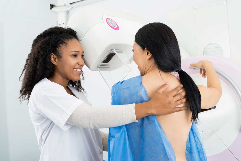 woman getting a mammogram