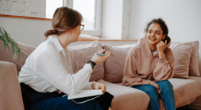 Young woman receiving mental health therapy