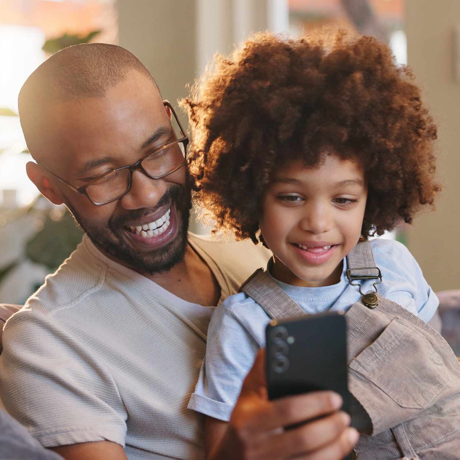 Dad on phone with child