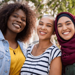 A group of people smiling at the camera