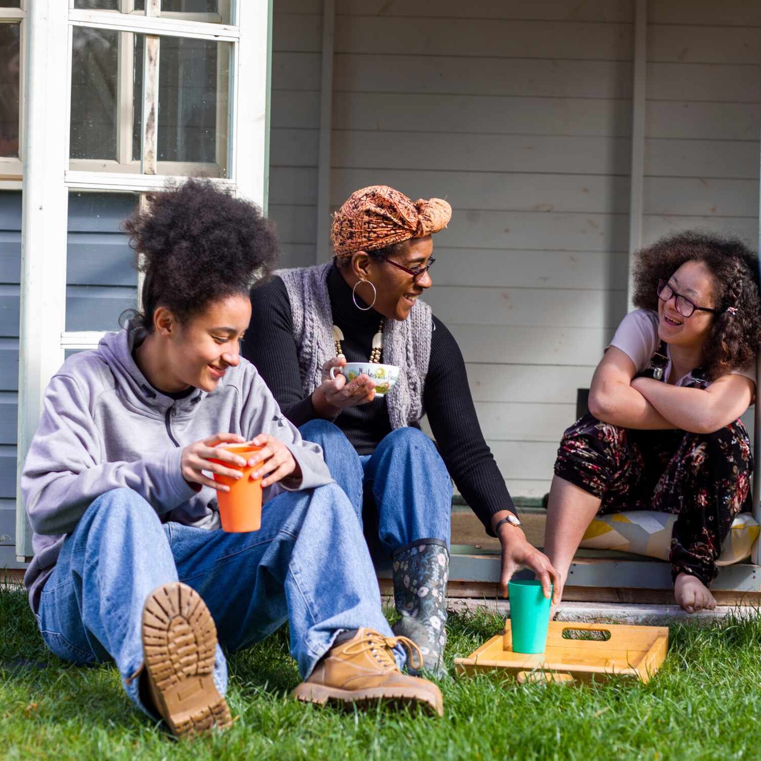 Family talking outside of home