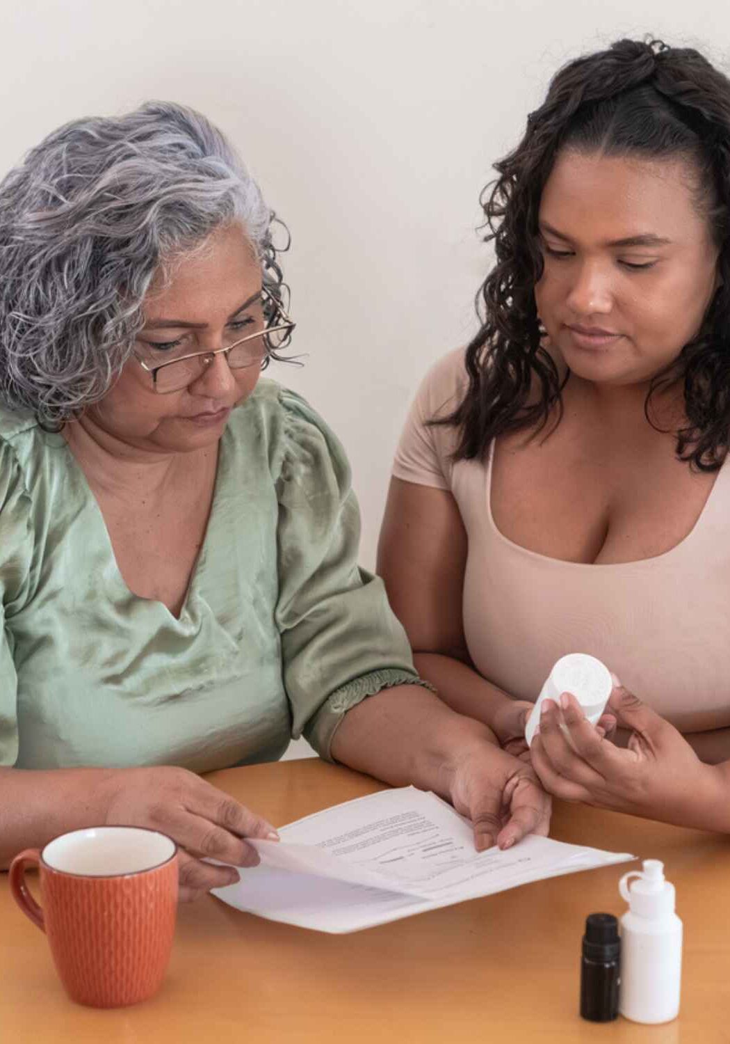Latina family reviewing prescription coverage
