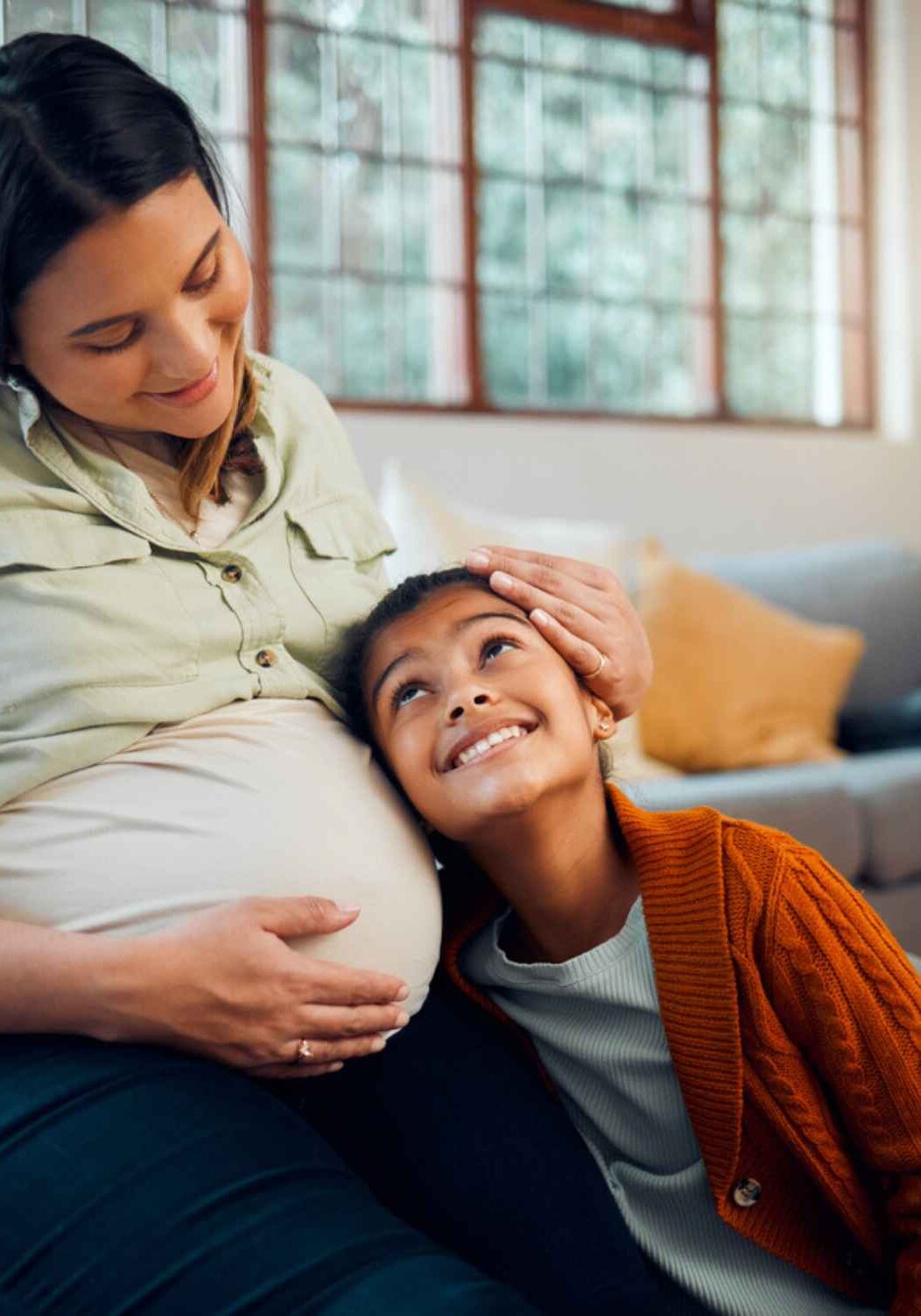 Pregnant parent with child